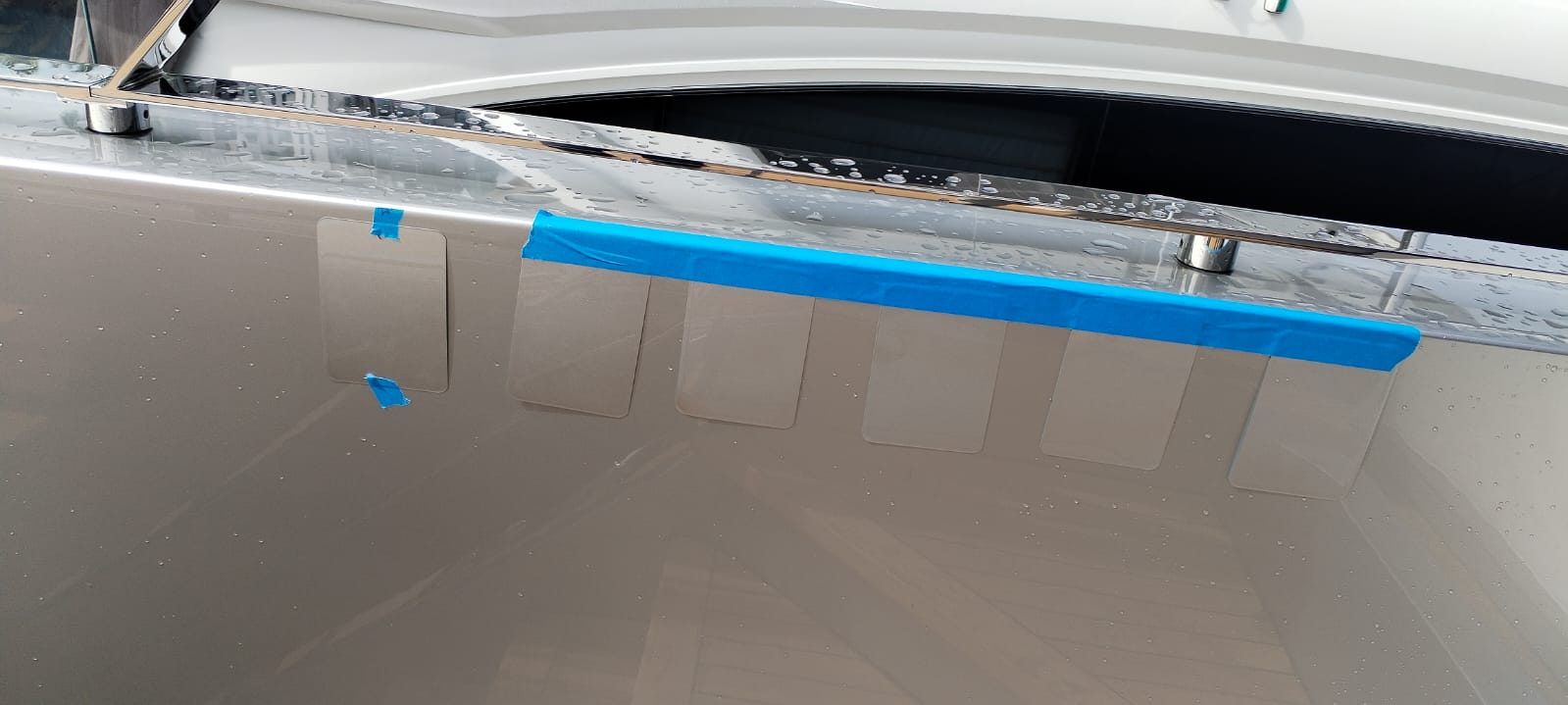 Bespoke colour matching — precision paint application on yacht hull