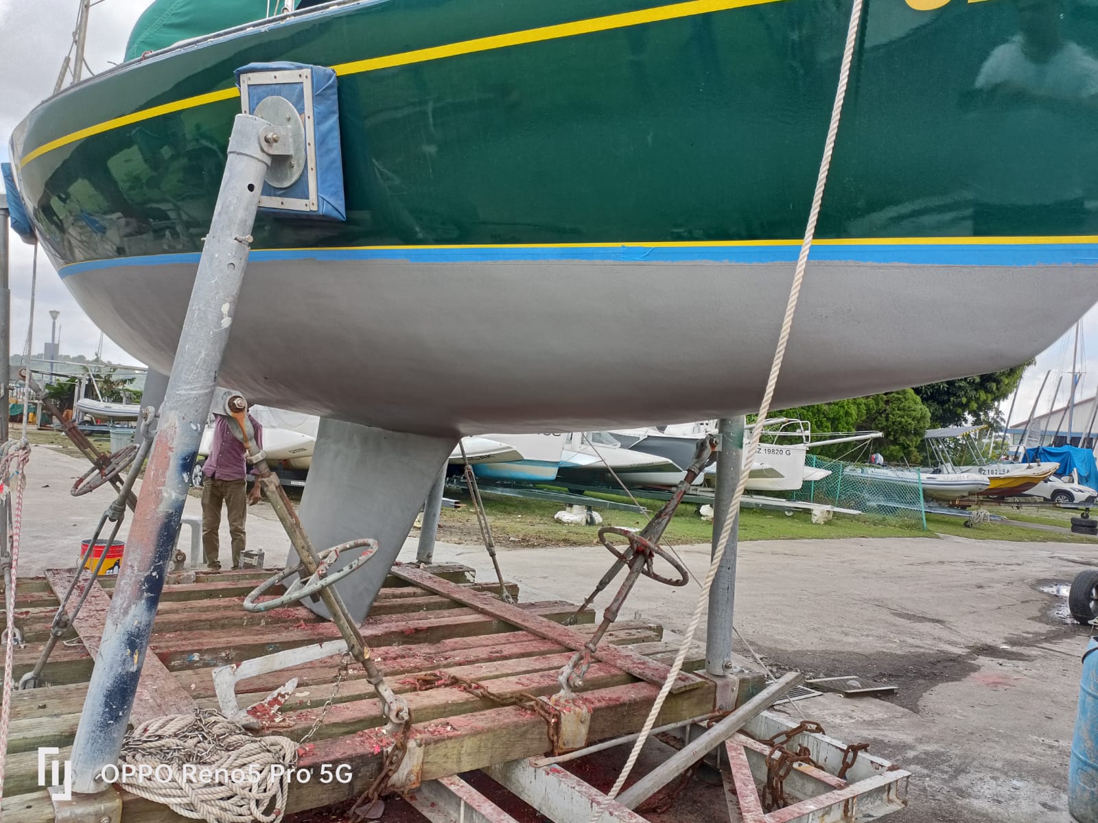 Hull coating — primer second coat application on yacht hull