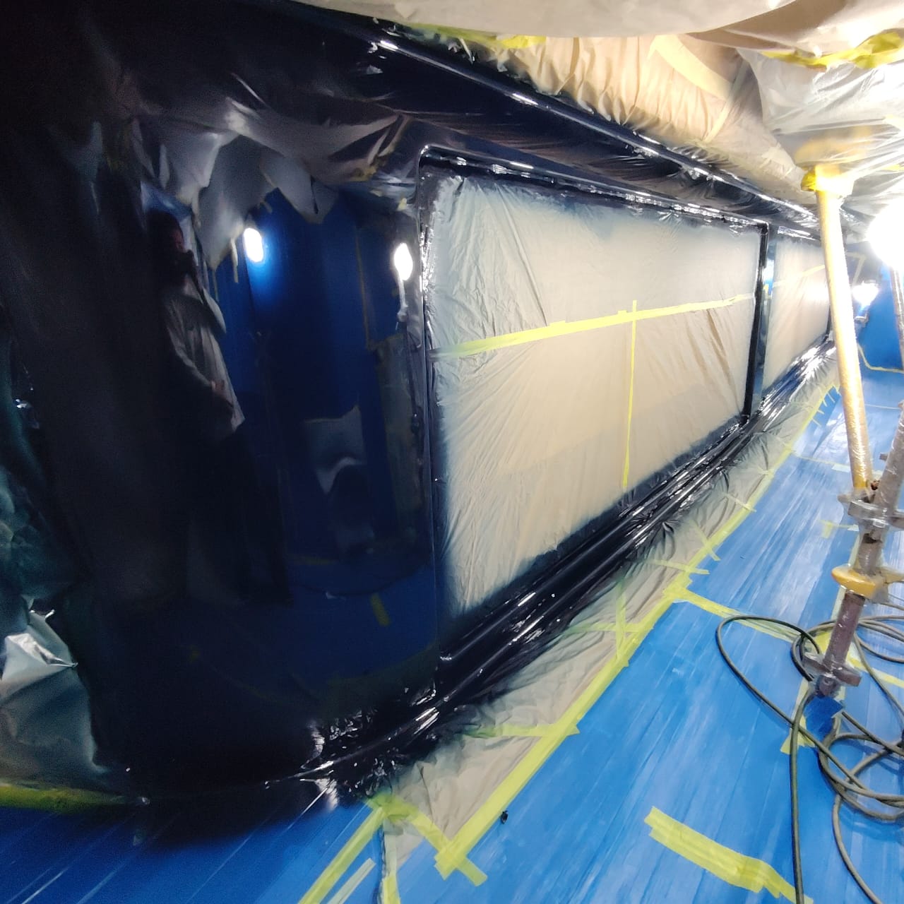 Yacht painting project 1 — full mast repainting result