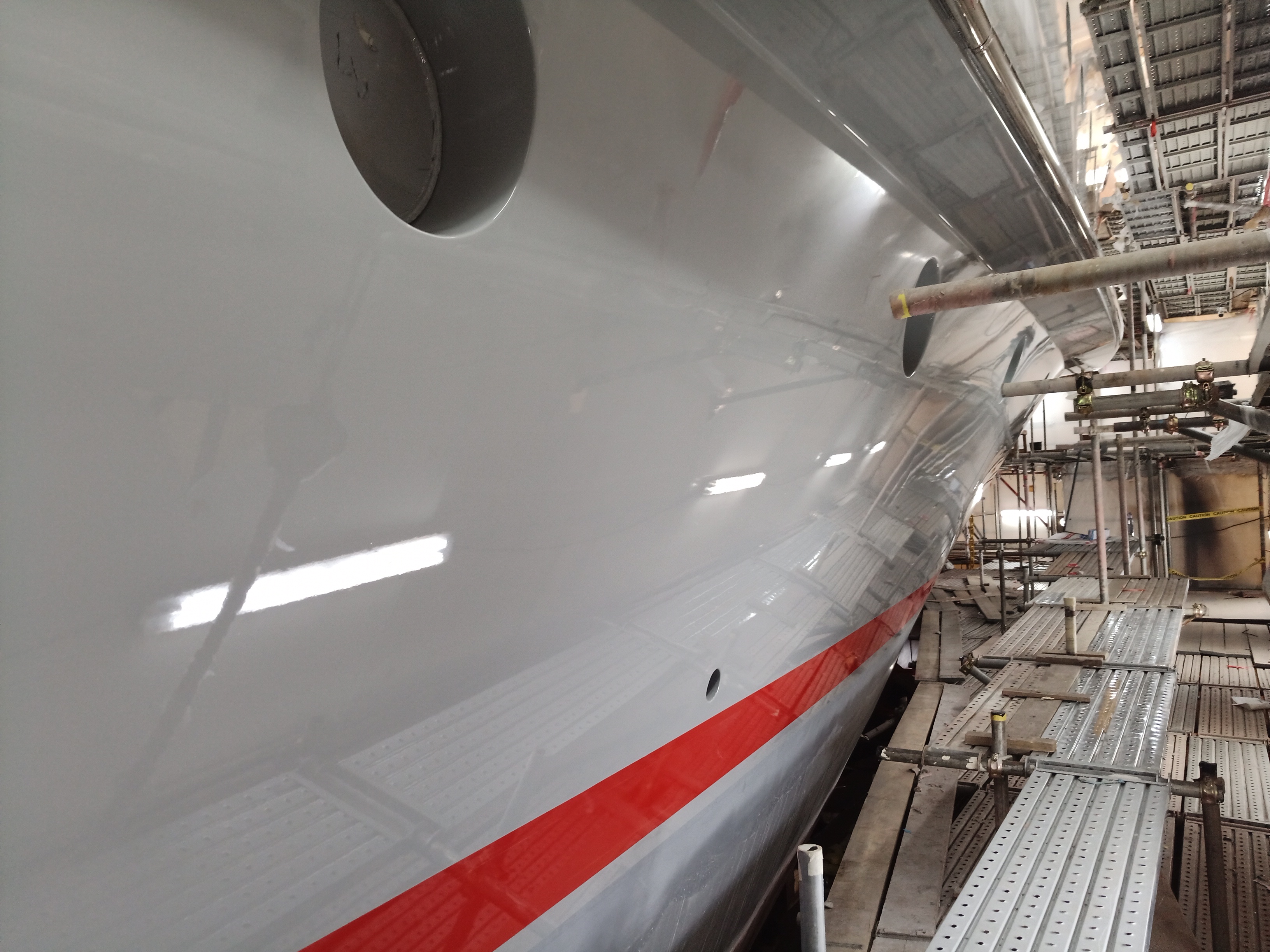 Yacht painting project 6 — hull painting in progress