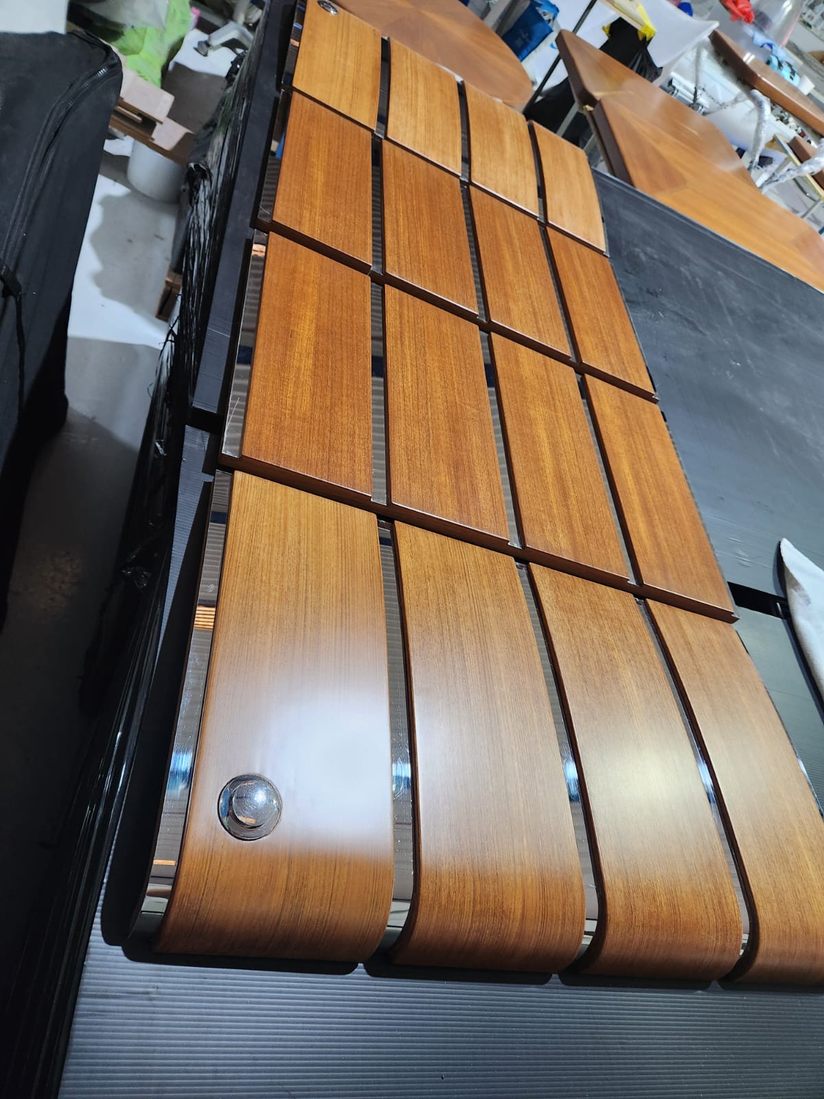 Yacht varnishing — completed brightwork with UV-resistant finish